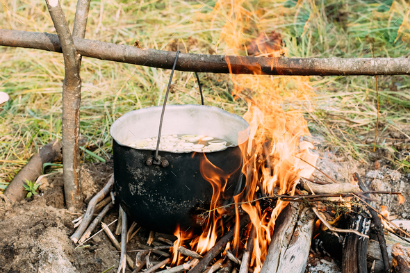 Old Camp Saucepan Boiled Water For Soup Preparation On A Fire In